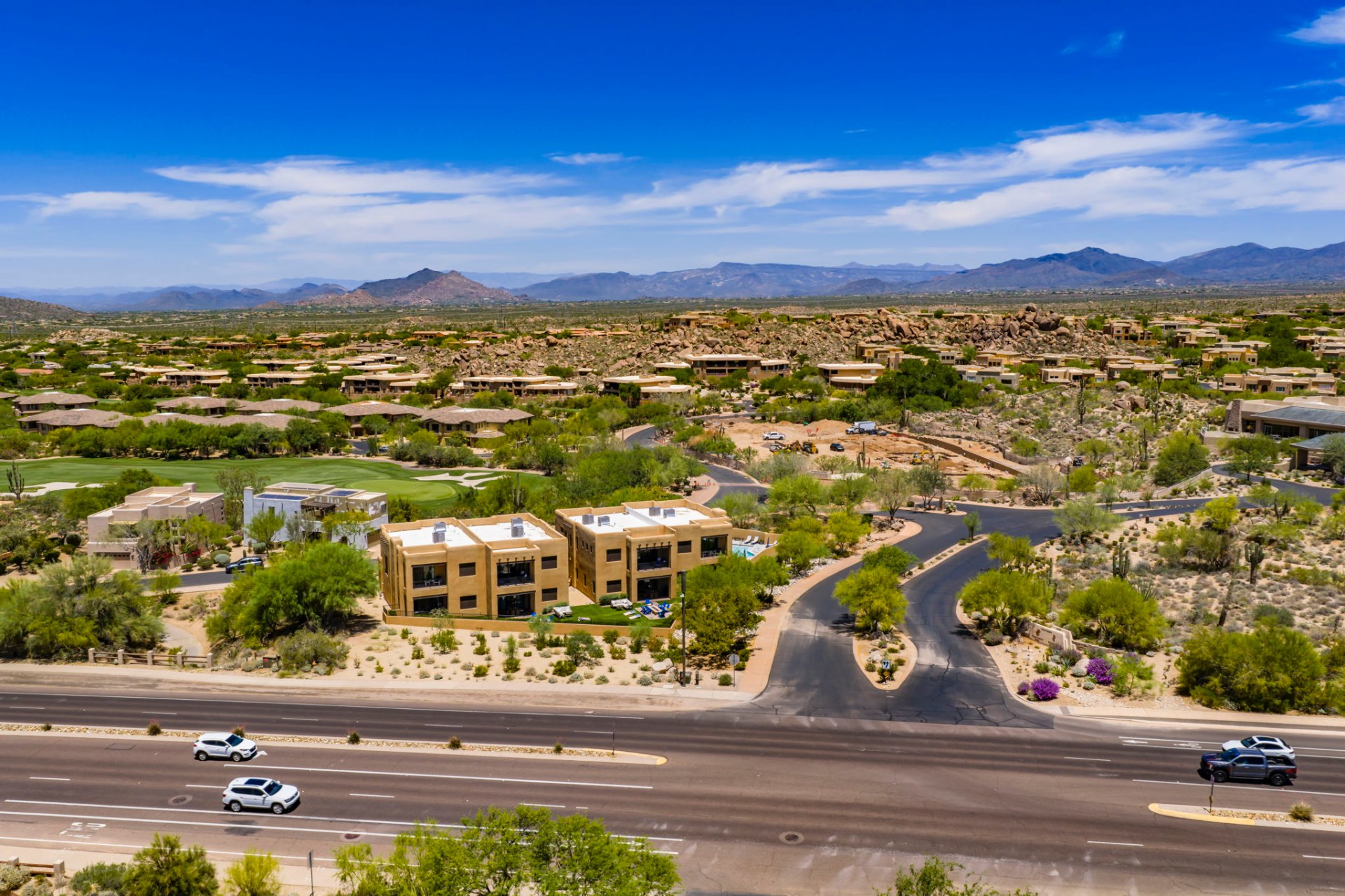 Four luxury villas surrounded by Scottsdale desert landscape